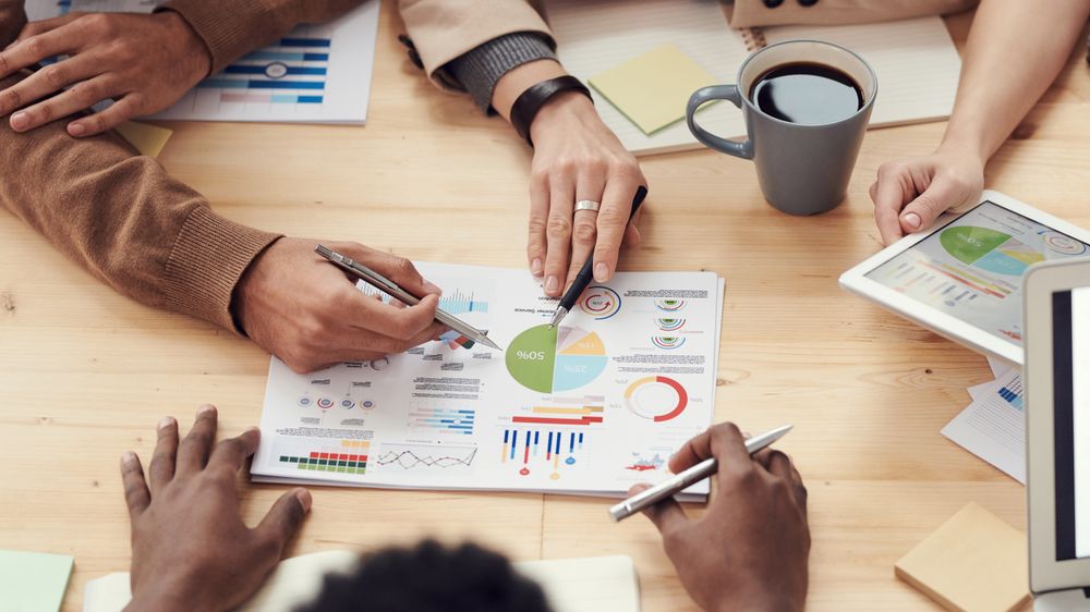 Consultants reviewing business data