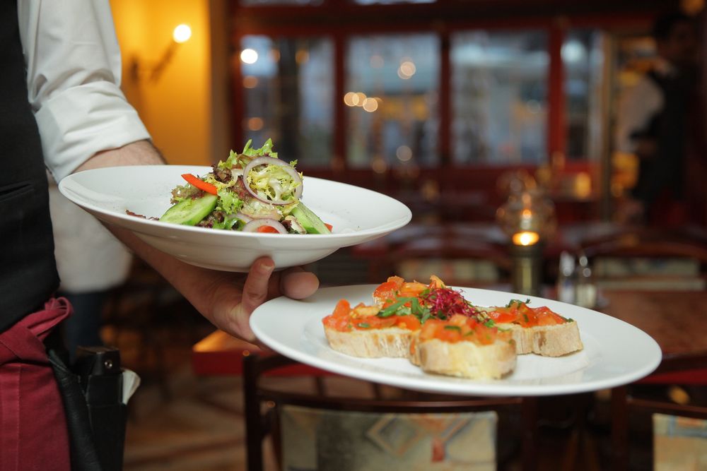 Restaurant dishes being served